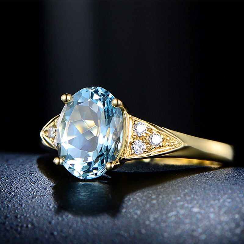 Simulated aquamarine gemstone ring with a micro inlaid gemstone opening ring and a sea blue moissanite diamond ring