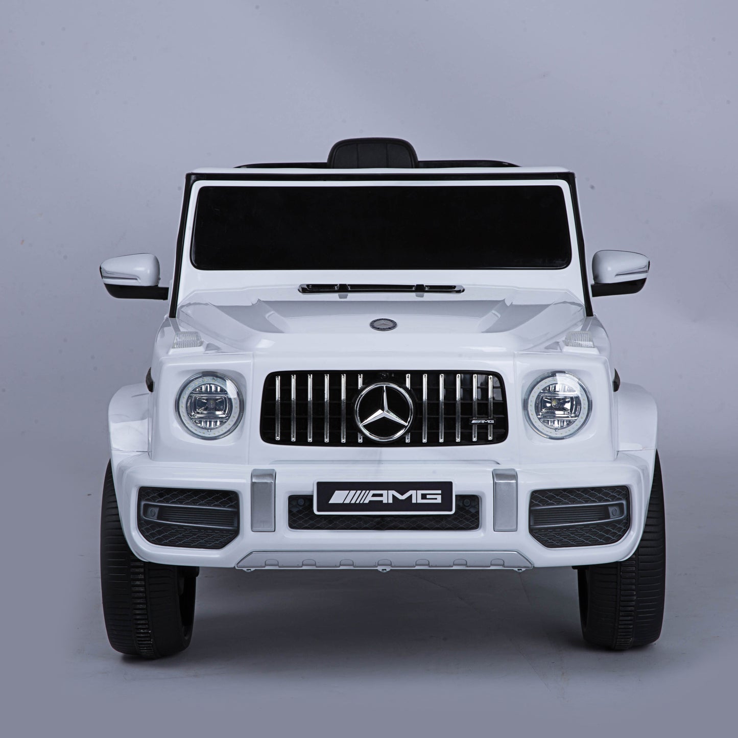 Mercedes Benz G63 Children's Electric Vehicle with Remote Control 12V Music, Horn, Spring Suspension, Safety Lock and License