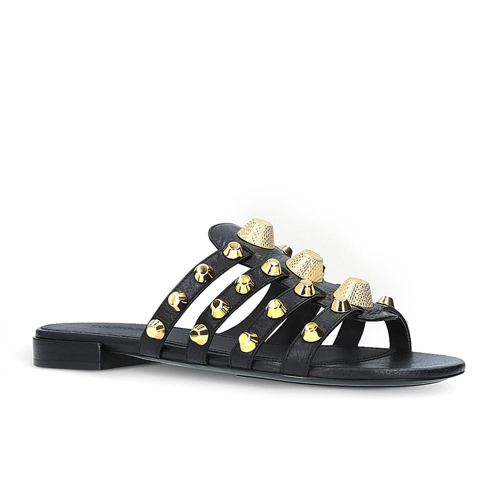 Metal rivet decorated flat bottomed slippers oversized sandals