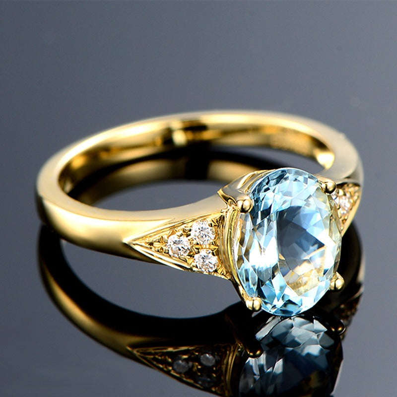 Simulated aquamarine gemstone ring with a micro inlaid gemstone opening ring and a sea blue moissanite diamond ring