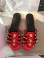 Metal rivet decorated flat bottomed slippers oversized sandals